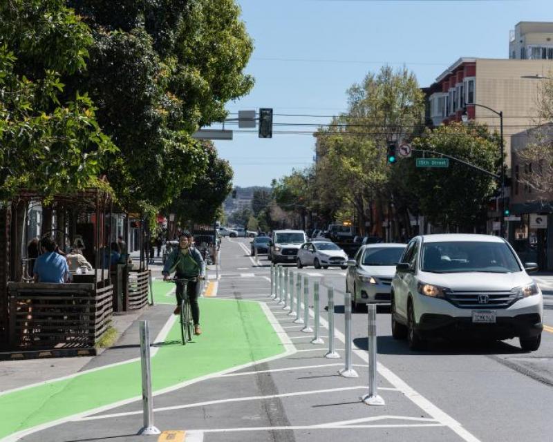 Person biking on the new street design on Valencia Street