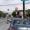 7th Street before: bicyclist riding in faded bike lane