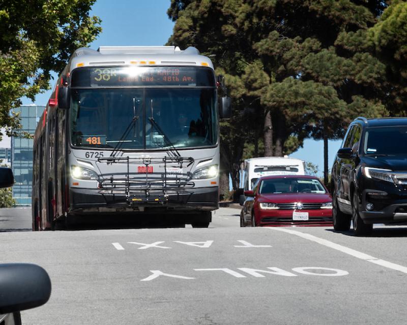 Photo of bus driving in transit lane
