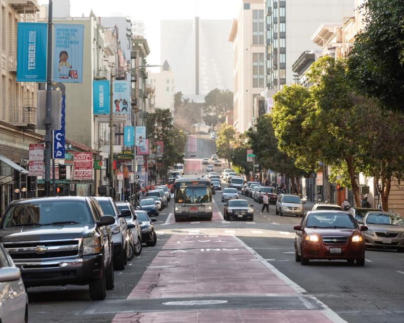 38 Geary driving on a red transit only lane in the Tenderloin
