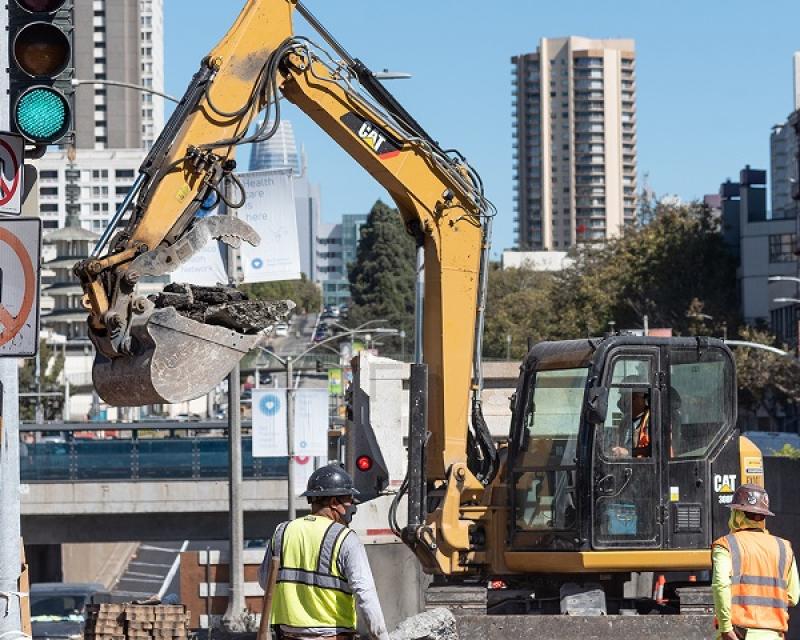 Photo of pedestrian refuge island under construction at Geary Boulevard and Steiner Street