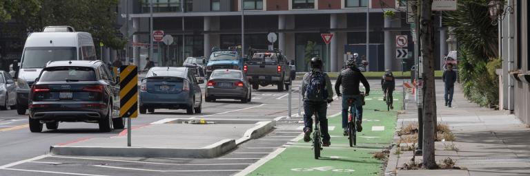 People biking on 8th Street towards Townsend 